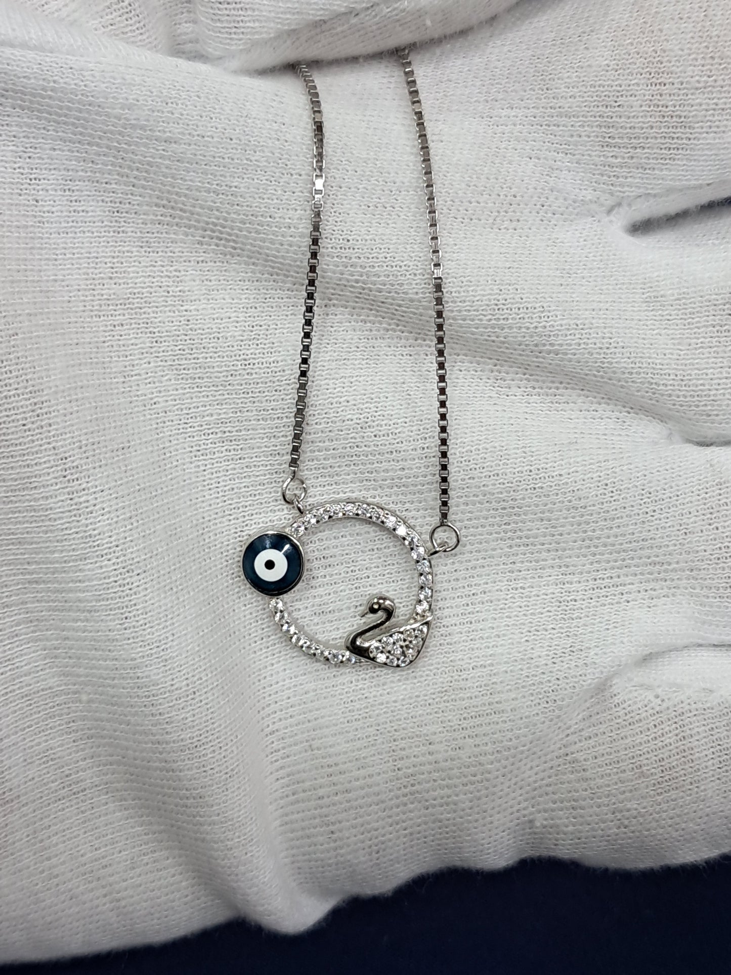 Evil eye with swan chain pendant