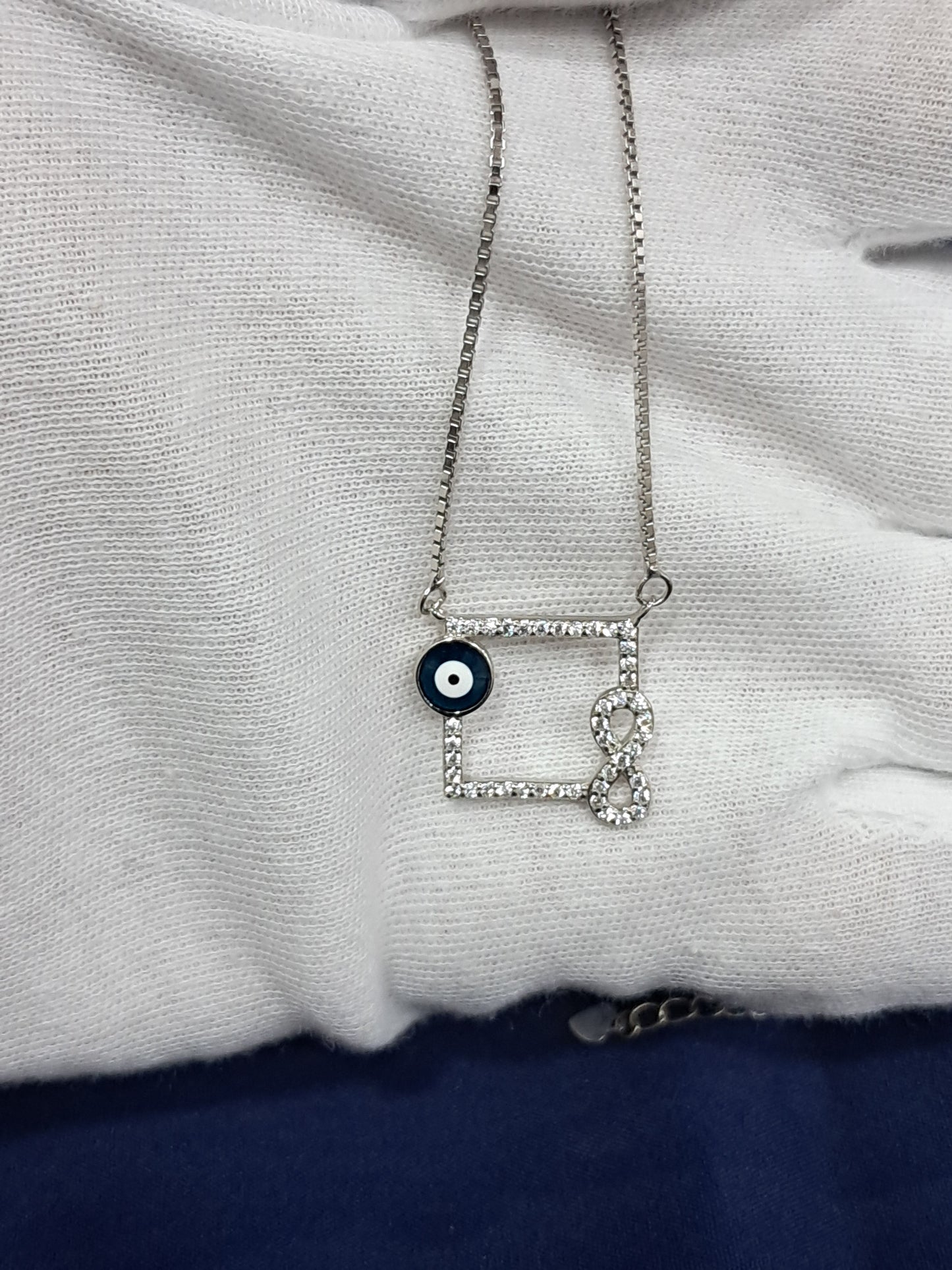 Evil eye with infinity chain pendant