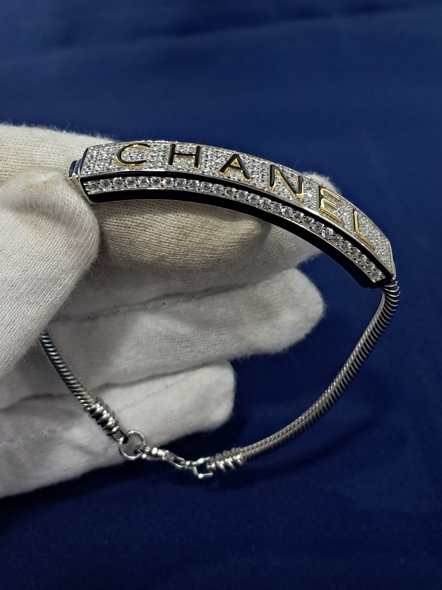 Chanel(written) silver bracelet